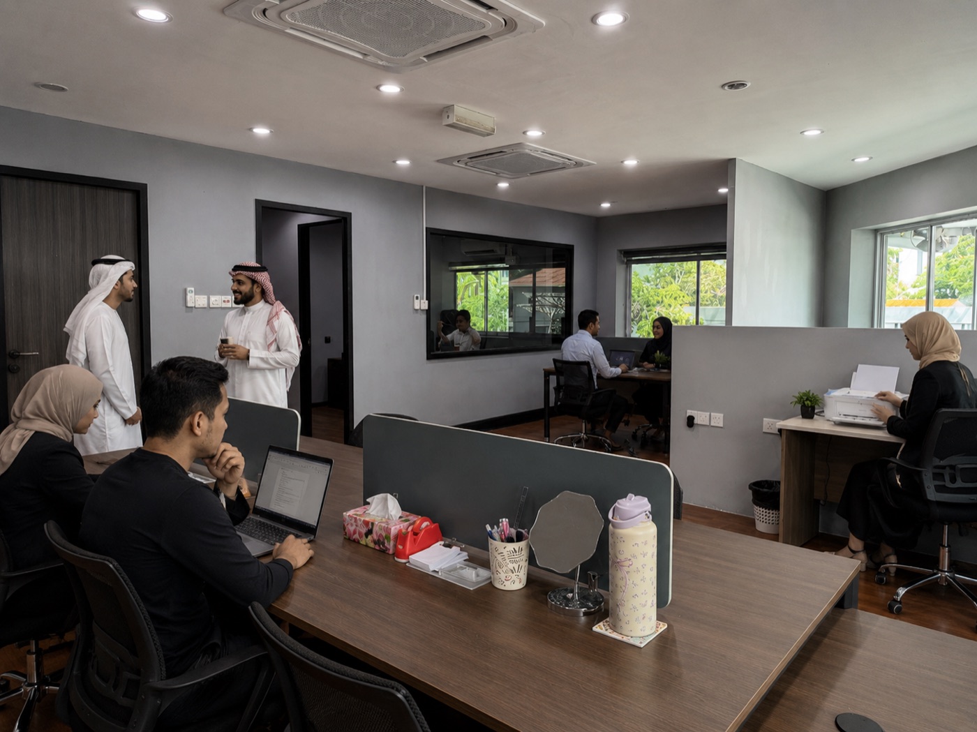 Phoenix team collaborating across the office floor